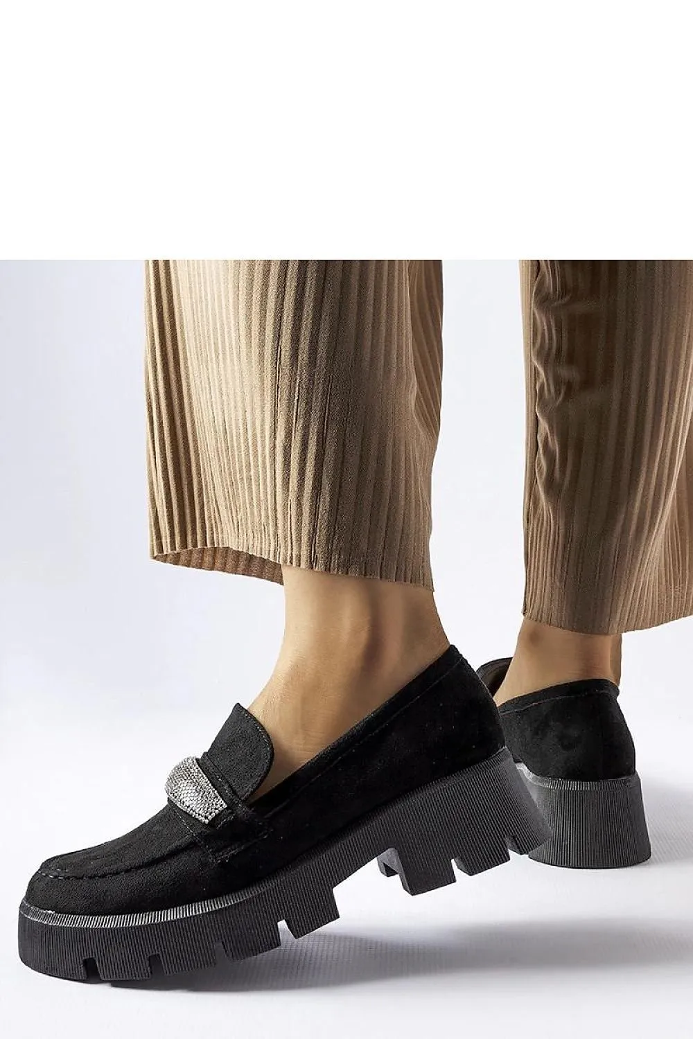 Black moccasins with a massive sole
