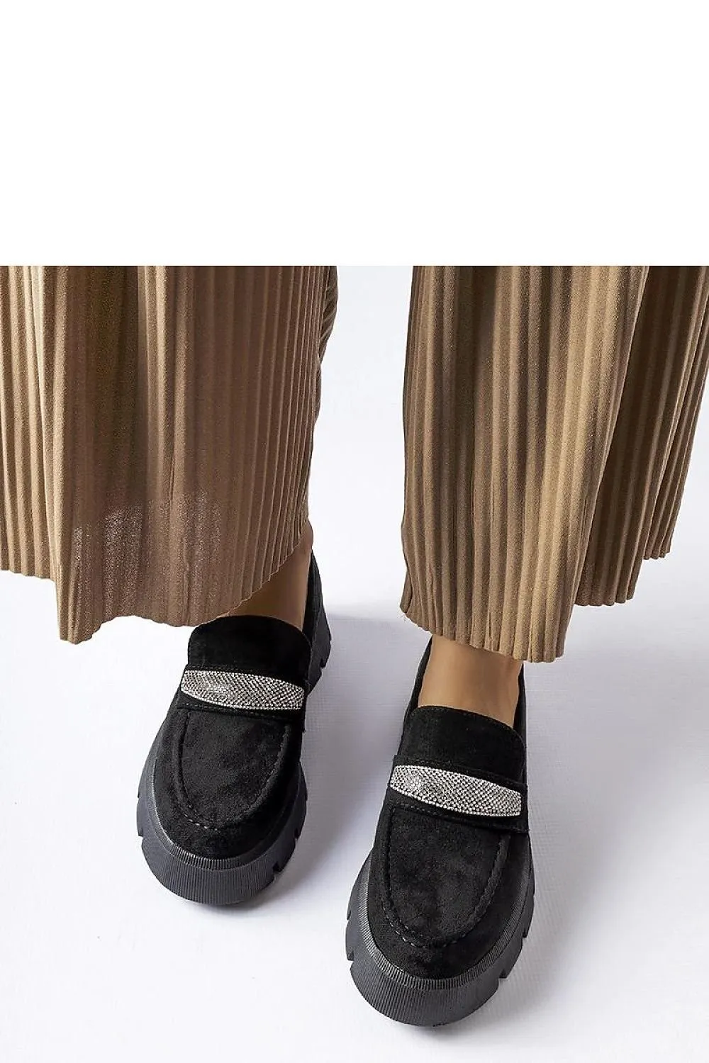 Black moccasins with a massive sole
